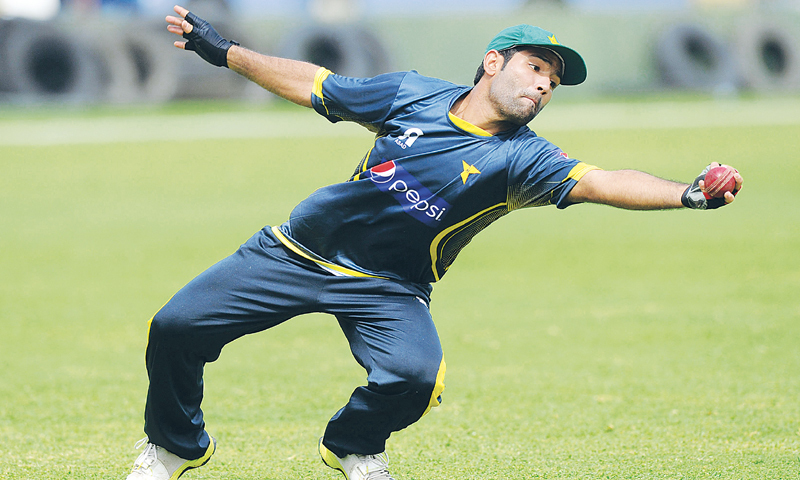 ASAD Shafiq catches the ball during a practice session on Tuesday.—AFP