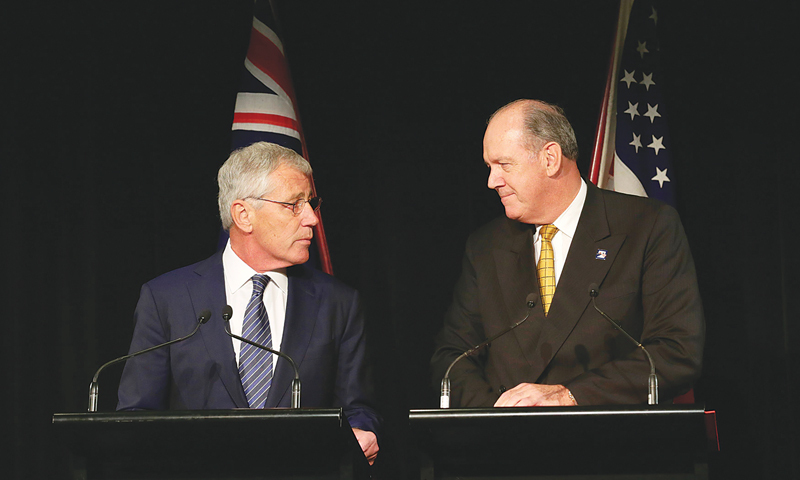 US Secretary of Defence Chuck Hagel (left) and his Australian counter part David Johnston speaking during a joint press conference in Sydney.—AFP