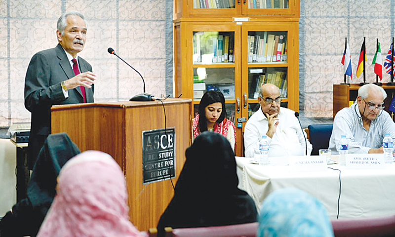 Dr Rifaat Hussain speaks at a seminar titled ‘The regional scenario in South Asia after the withdrawal of Nato forces from Afghanistan’ organised by the Area Study Centre for Europe, University of Karachi, on Thursday. — Photo by White Star