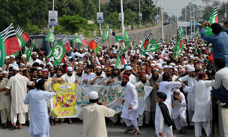 Activists of Ahl-e-Sunnat-wal-Jamaat (ASWJ) hold a protest Defence and Stability of Pakistan rally from Lal Masjid to National Press Club. — Photo by INP