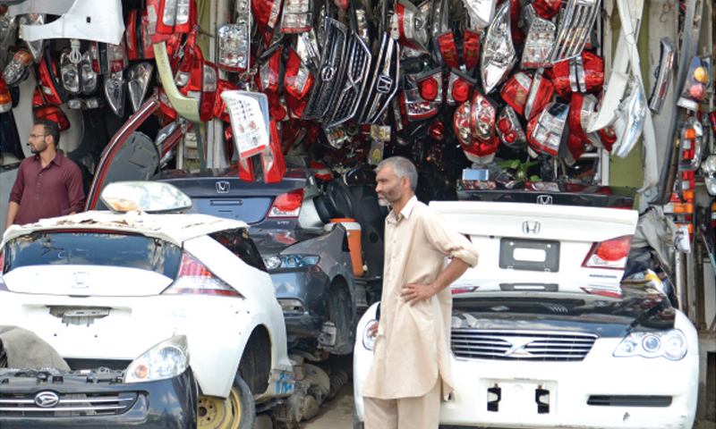 Shops at Sultan Ka Khoo selling car body parts and second-hand engines. — Photos by Khurram Amin