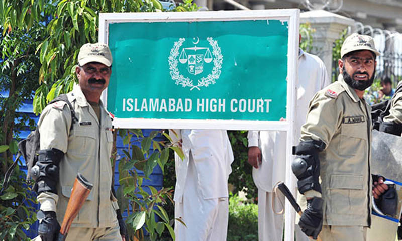 This picture shows paramilitary soldiers exiting the Islamabad High Court (IHC). — File photo/AFP