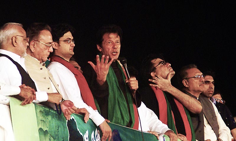 PTI Chairman Imran Khan addressing the participants of Azadi march .— Photo by INP