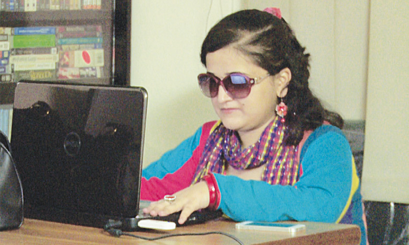 Ammara working on her laptop, Photo by the writer