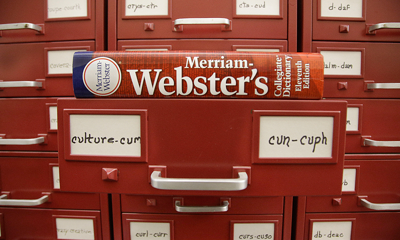 A Merriam-Webster dictionary sits atop their citation files for the 2014 word of the year, &ldquo;culture.&rdquo; &mdash; AFP 