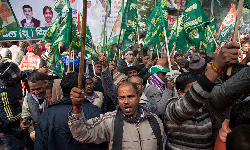 Rashtriya Janata Dal and Samajwadi Party supporters participate in an anti-government protest in New Delhi, Dec 22, 2014. The protesters voiced their disapproval for right-wing Hindu groups allied to the ruling Bharatiya Janata Party conducting a series of ceremonies across India over the past week to convert Christians and Muslims to Hinduism. - AP
