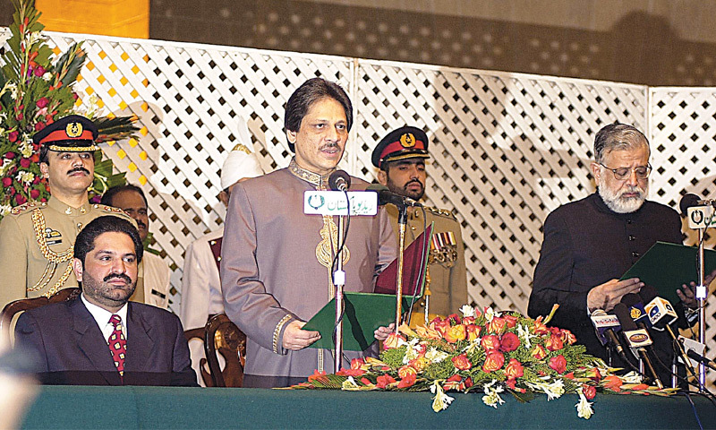 Dr Ishratul Ibad being sworn in as governor by then chief justice of the Sindh High Court Syed Saeed Ashhad at Governor House on Dec 27, 2002.—Dawn photo library