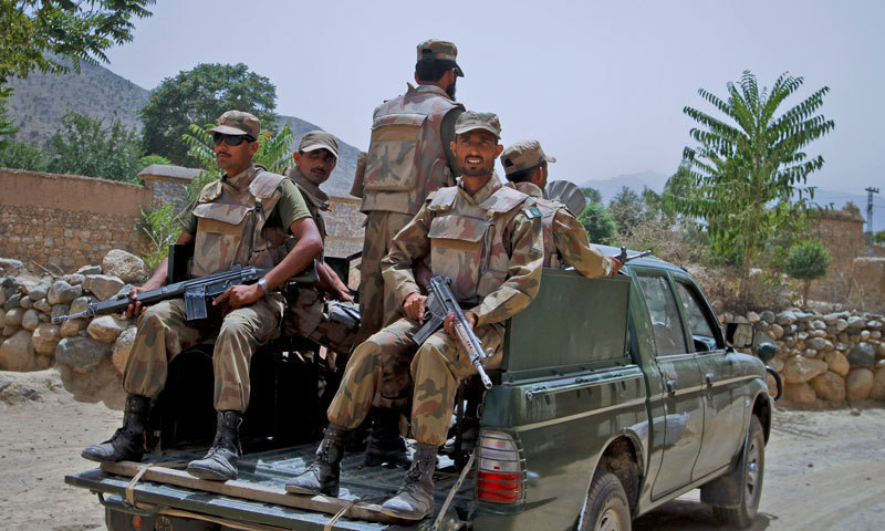 This picture shows security personnel patrolling a road in Balochistan. — INP/File