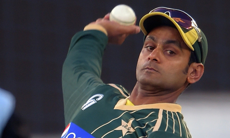 Mohammad Hafeez bowls during a net practice session at Dubai International Stadium in Dubai. — AFP/File