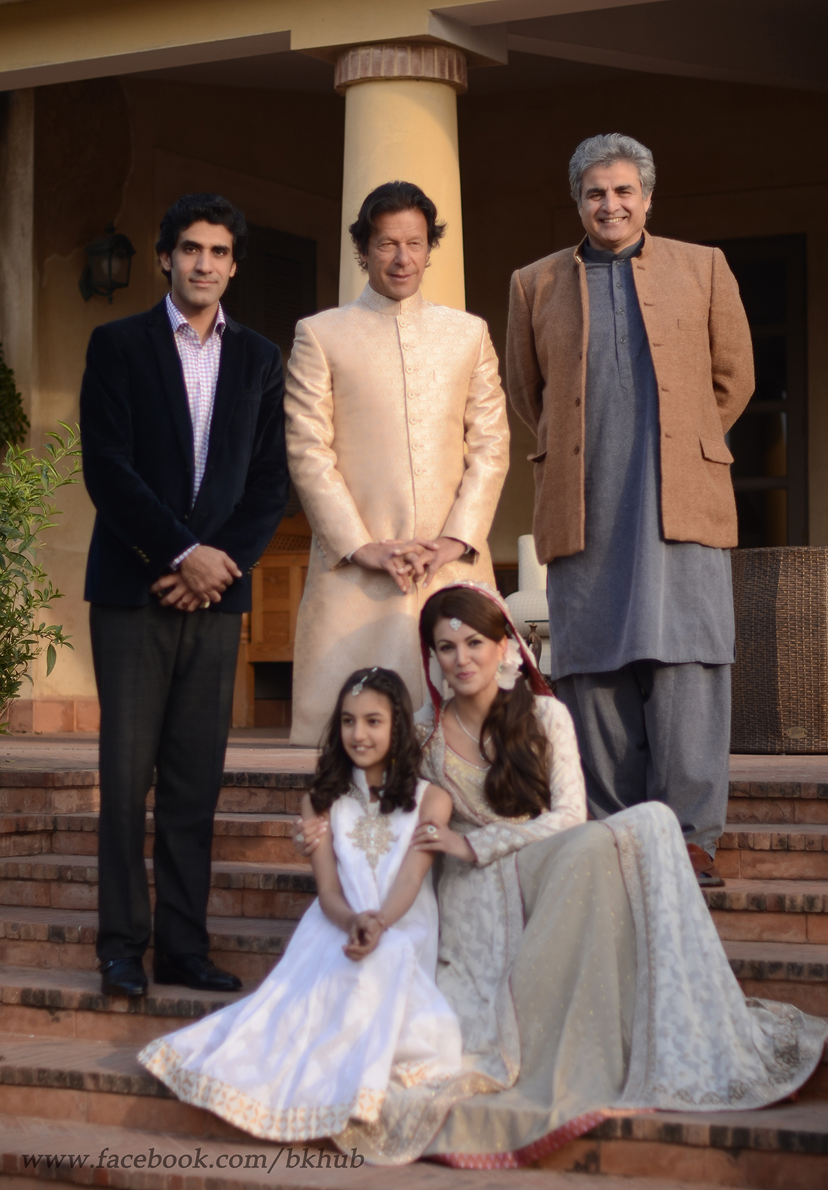 The couple pose with guests at the wedding.— Photo by Belal Khan