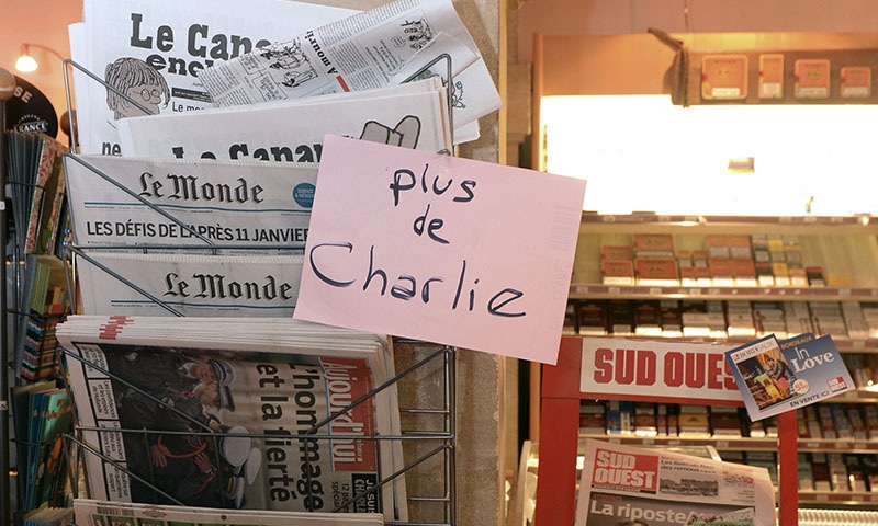 A sign which translates as "Charlie Hebdo - Sold Out"  is displayed at a newsagents in Bordeaux as latest edition of French satirical weekly goes on sale.  The first issue of satirical magazine Charlie Hebdo to be published since a jihadist attack was sold out within minutes at kiosks across France. - AFP Photo