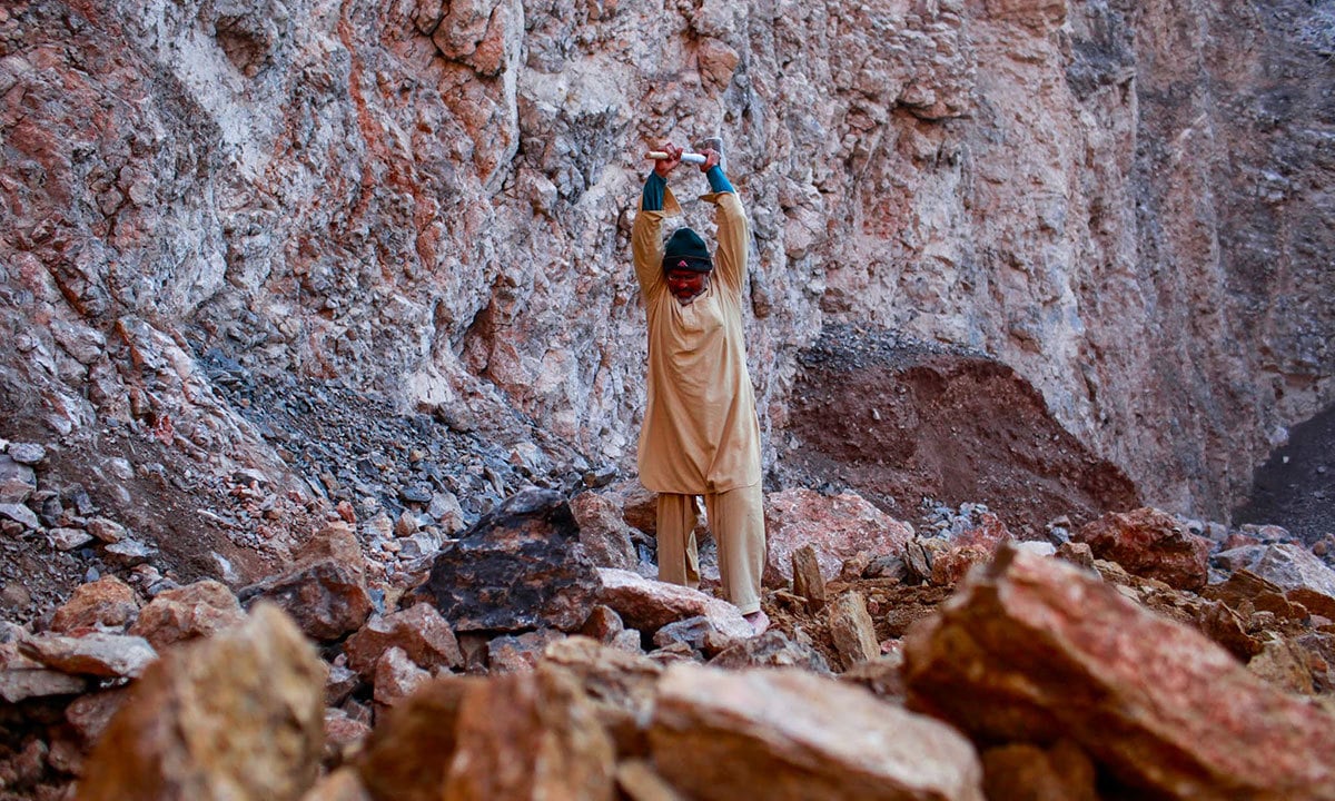 Abdul Rehman has been breaking rocks for 30 years. He is from Swabi and lives in Sangjani with his family. - Photo by writer