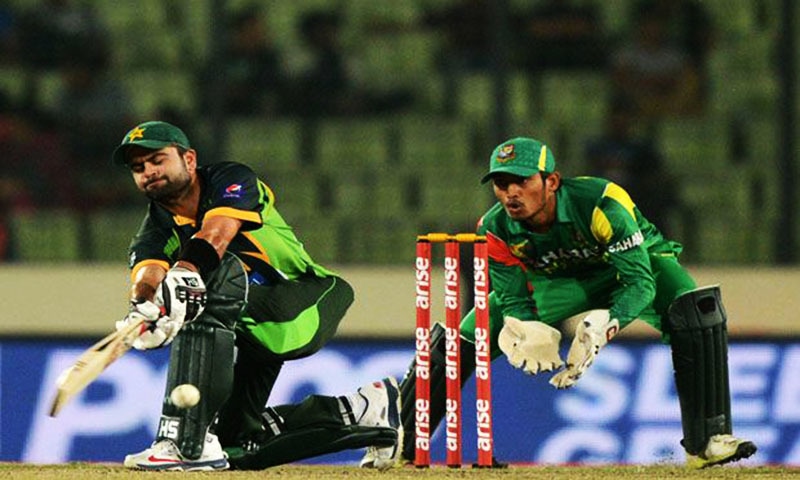 Ahmed Shehzad playing a shot against Bangladesh. &mdash; AFP/file