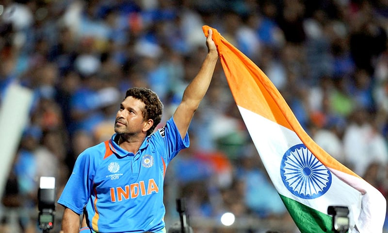 Sachin Tendulkar waves to the crowd after India's World Cup victory in 2011. — AFP/File