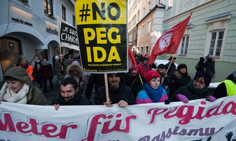 A protest by Pegida which drew just 150 people was dwarfed by a counter-demo of about 2000 on Feb 8, 2015 in Linz, Austria. -AFP