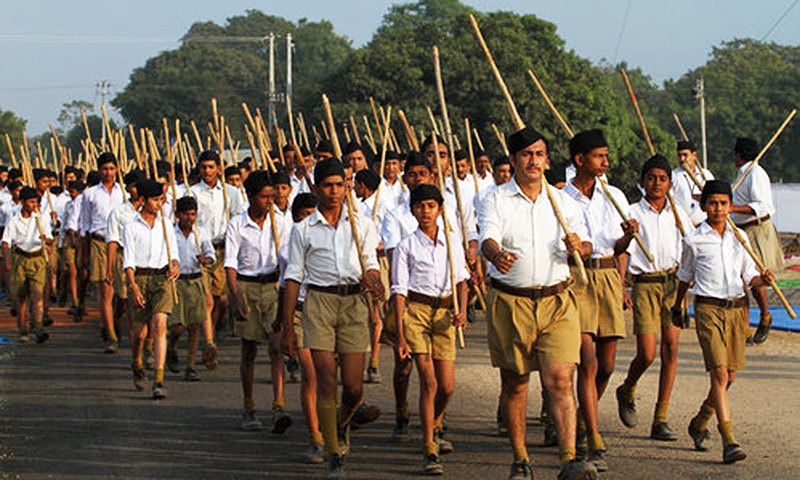 Volunteers of the Rashtriya Swayamsevak Sangh (RSS) march through a street during a three-day workers camp on the outskirts of Ahmadabad. —AP/file