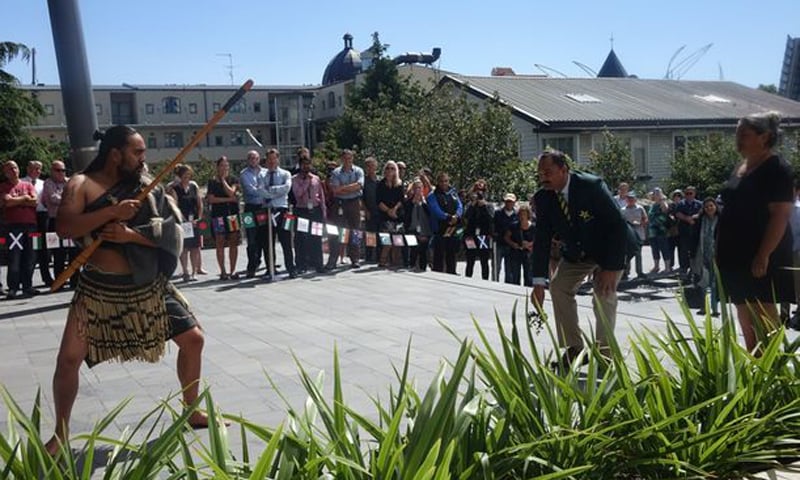 Pakistan manager Naveed Akram Cheema accepts the rautapu (symbol of peace) laid down by a kaiwero (warrior) &mdash;Photo courtesy Radio New Zealand News/ Sally Murphy