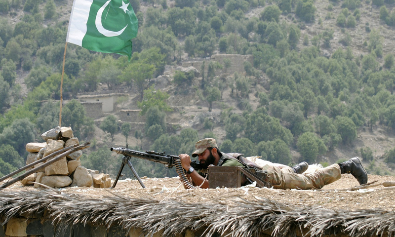 In this file photo, a Pakistani army soldier takes a position during a military operation against militants .—AP/File