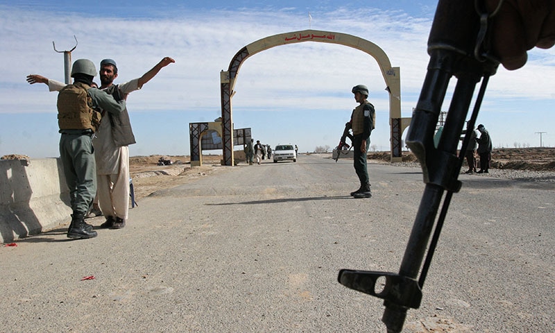 In this Thursday, Feb. 26, 2015 photo, Afghan security police stand guard at checkpoint in Helmand province, south of Kabul, Afghanistan.  &mdash; AP