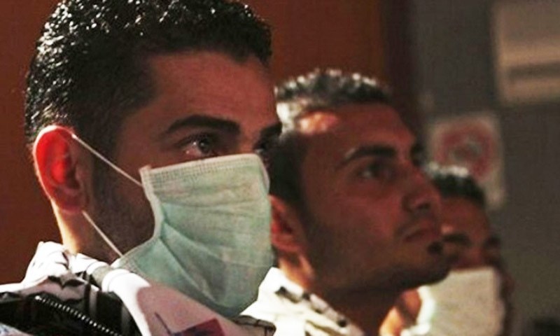 Surgical and protective masks can prevent the spread of swine flu ─ AP/File