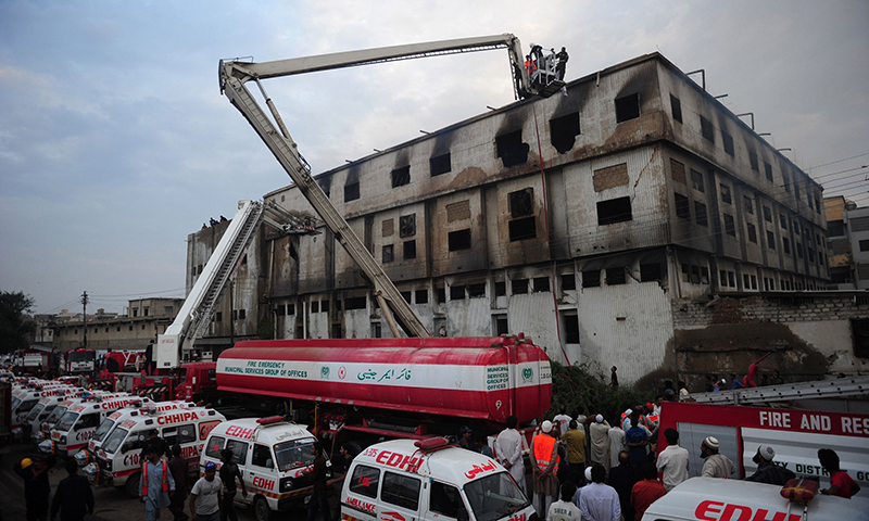 A view of rescue services being carried out at the factory in Baldia Town which was struck by a massive fire on Sept 11, 2012, killing at least 258 workers. —AFP/File