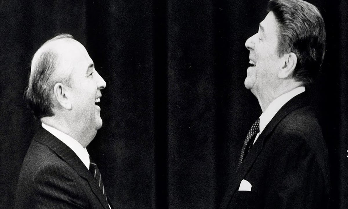 Former U.S. President Ronald Reagan shakes hands with former Soviet leader Mikhail Gorbachev at their first meeting in Geneva, Switzerland.&mdash;Reuters