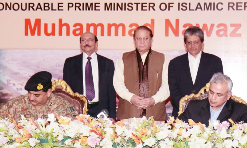 KARACHI: Prime Minister Nawaz Sharif witnesses the signing of MoU for the Karachi-Hyderabad Motorway.—INP