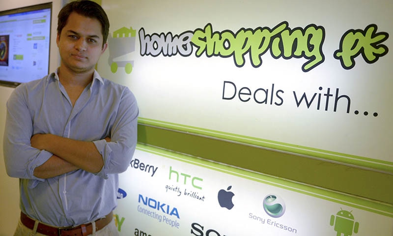 In this photograph taken on March 14, 2015, Shayaan Tahir, CEO of Homeshopping.pk, posing at his call centre in Karachi.  — AFP