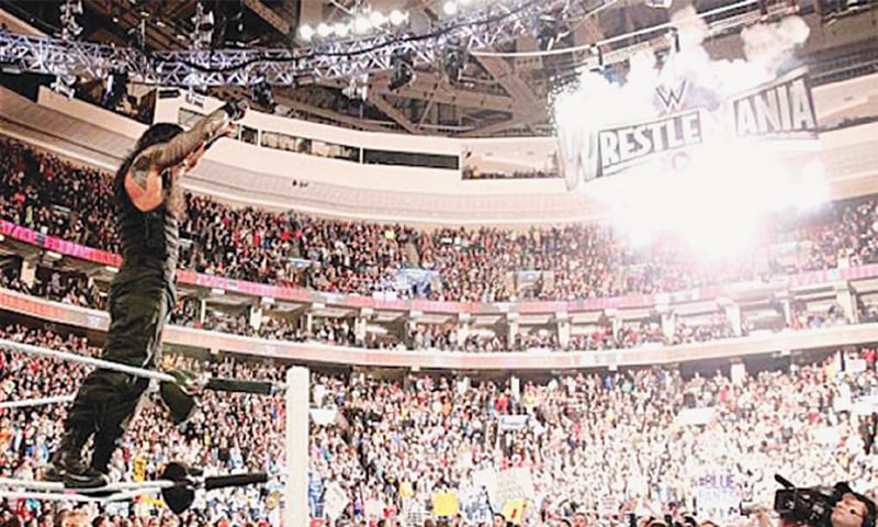 Roman Reigns before and after WrestleMania 31 loss