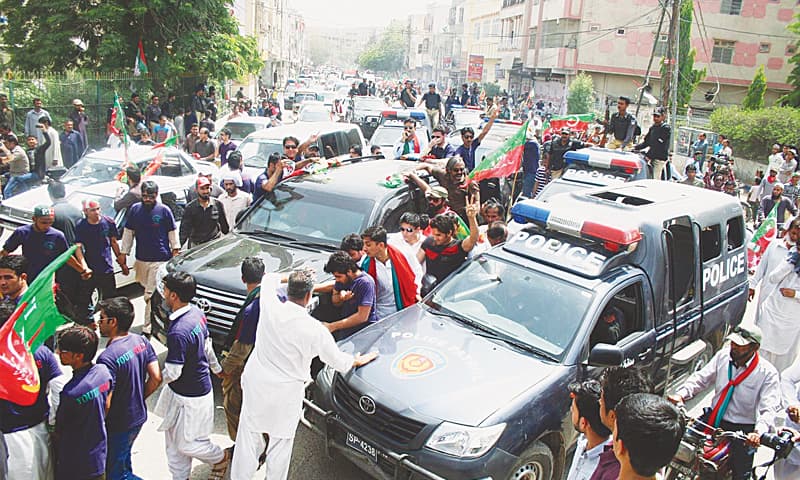 The commotion caused by overzealous activists and a heavy police contingent led Imran Khan into minor traffic accidents during his brief trip to Karachi
