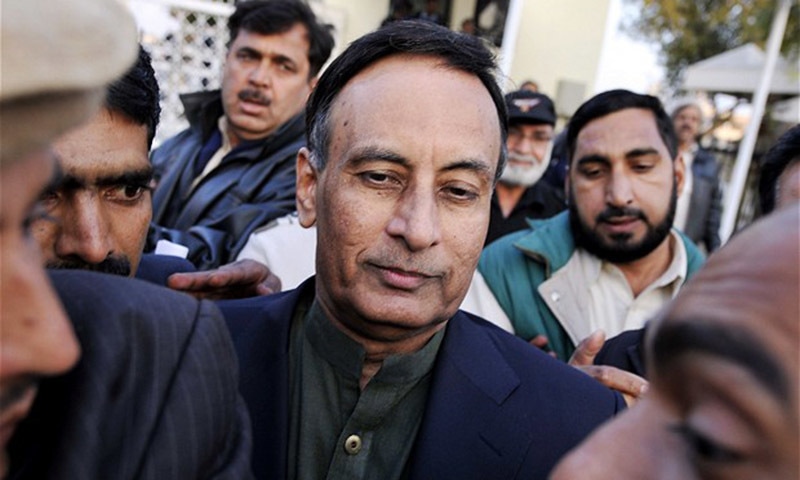 Pakistan's former ambassador to United States Husain Haqqani (C) exits the Supreme Court after meeting his lawyer Asma Jehangir, in Haqqani's defence in the secret memo scandal case, in Islamabad on December 22, 2011. — AFP/file