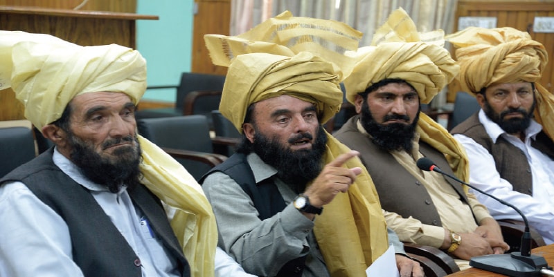 Tribal elders address a press conference in Peshawar on Monday. &mdash; White Star
