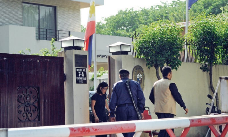 People seen leaving the Phillipines embassy in Islamabad on Friday. &mdash; Photo by Tanveer Shahzad