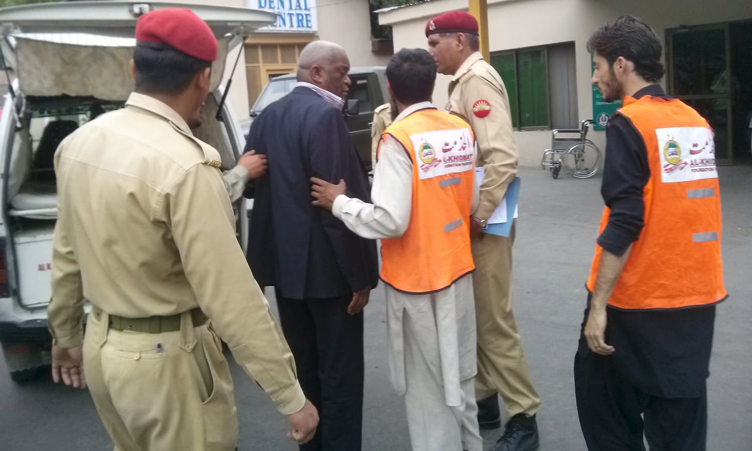 Staff members help a person who was injured during a helicopter crash, at the Combined Military Hospital (CMH) in Gilgit  &mdash; Reuters