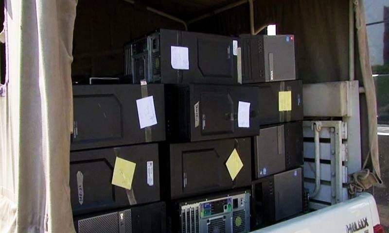 A view of the computers confiscated by the FIA team from Axact's Islamabad Office on Tuesday. — DawnNews screengrab