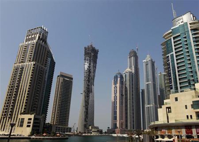 Real estate property under construction is seen near the Dubai Marina in this file photo.—Reuters