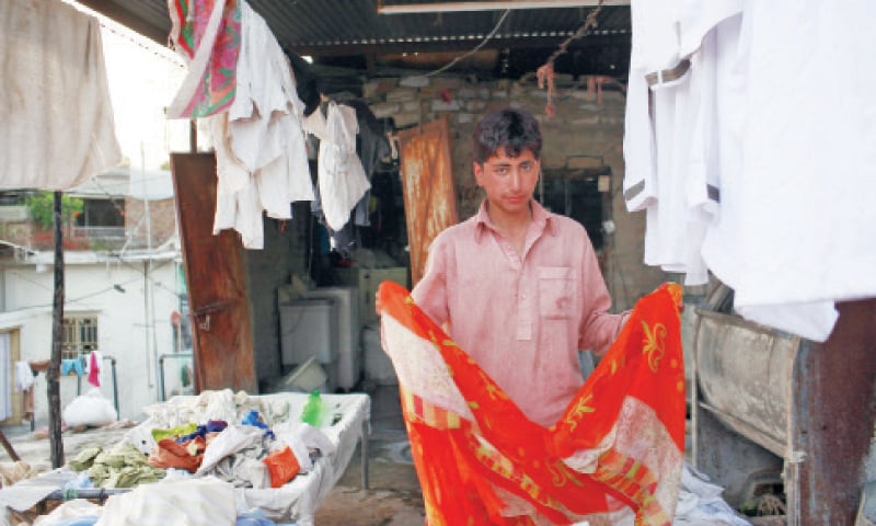Shabir, 18, is from Muzaffarabad. &ldquo;I am in town for my summer holidays and wanted to make some money so I joined in with my cousin who also works here. We take turns; sometimes I operate the machine to spin the clothes, other times I hang them out to dry. In these few months, I&rsquo;ll be able to pay the next tranche of my college fee.&rdquo;