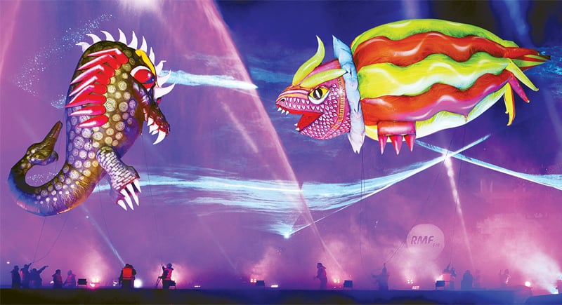 Krakow (Poland): Dragon balloons are seen in the night during the 15th annual Dragon Festival, organised by the local ‘Grotesque’ theatre. Krakow is famous for its legend of a dragon that once lived under the Wawel
Castle Hill.—AP