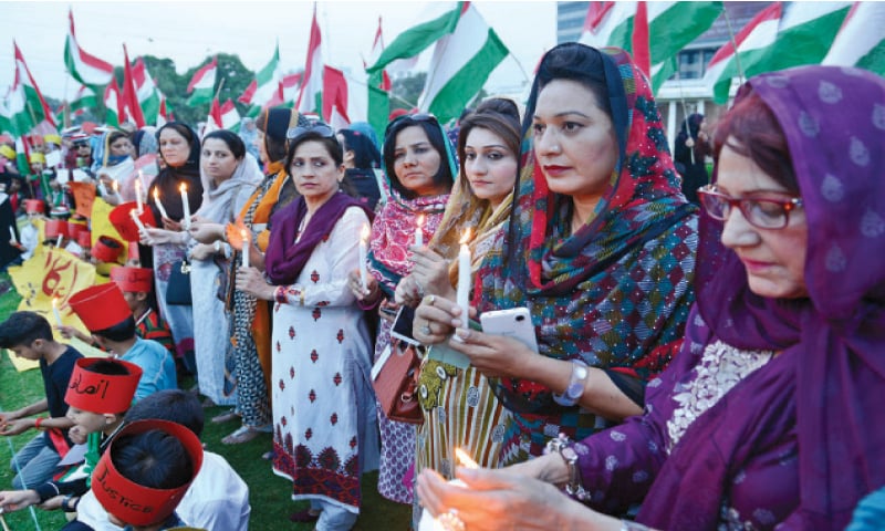 PAT holds vigil for Model Town victims - Newspaper - DAWN.COM