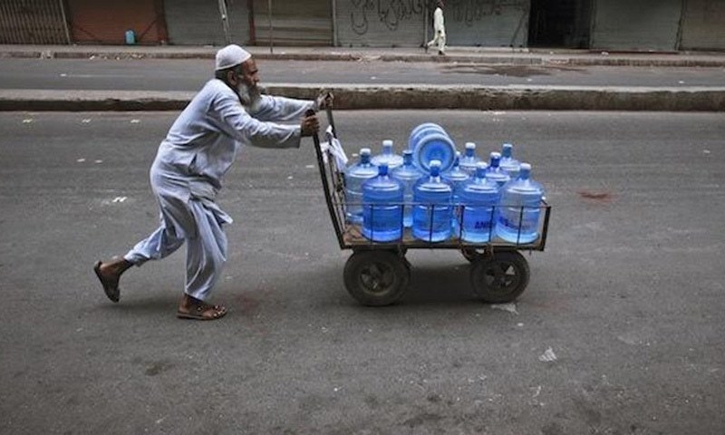 Bottled water is consumed by a very small percentage of people in urban areas who can afford to do so; the rest of the population uses groundwater. ─ Reuters/File