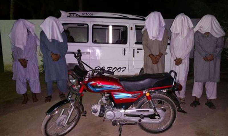 A view of the explosive-laden vehicle and motorcycle along with suspects arrested during antelligence based operations conducted by security security forces in Karachi and Hyderabad. — Photo courtesy ispr.gov.pk