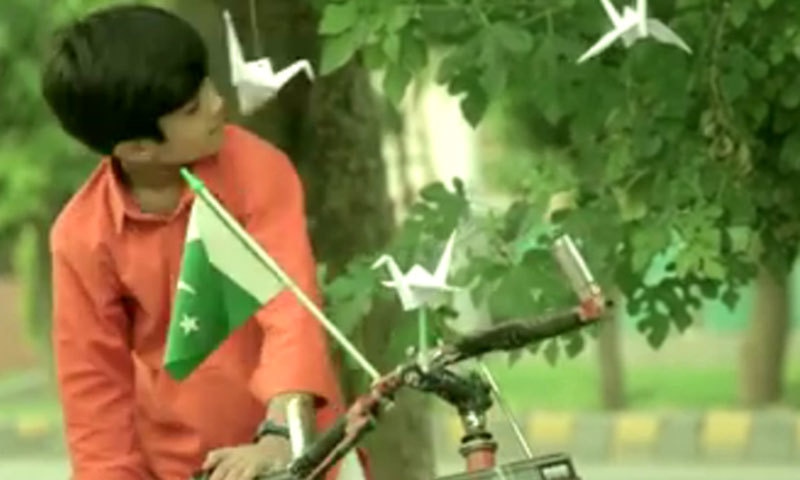 Screengrab shows origami birds on a tree symbolising peace