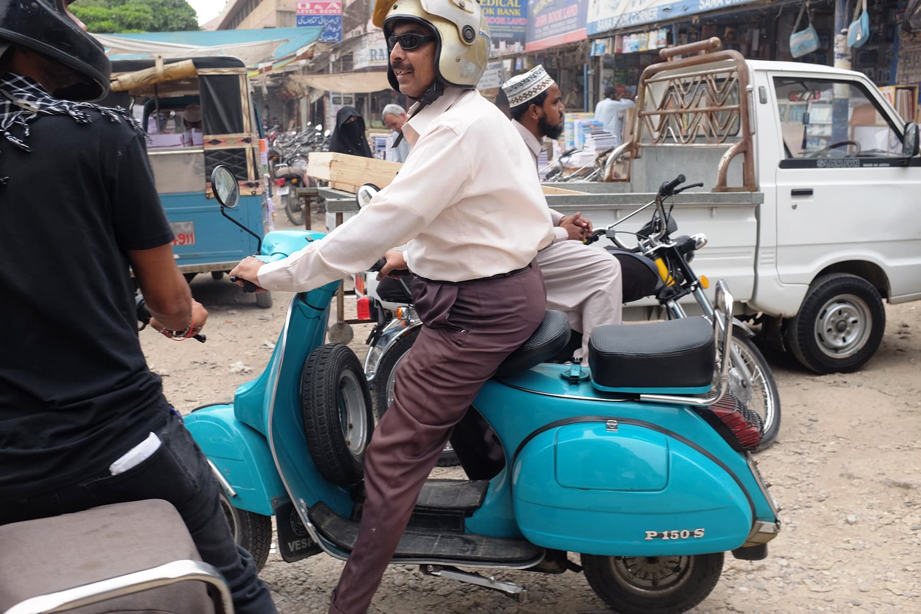 We spot a lot of people going about their business in Vespas.