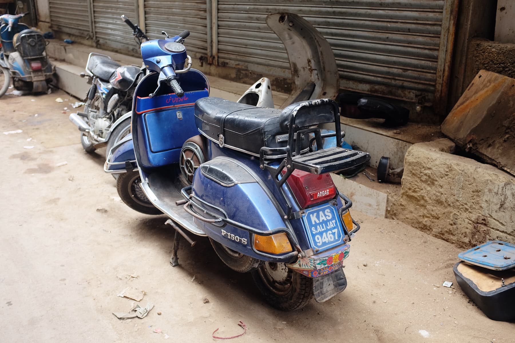 Shehzad shows us different Vespas near his workshop.