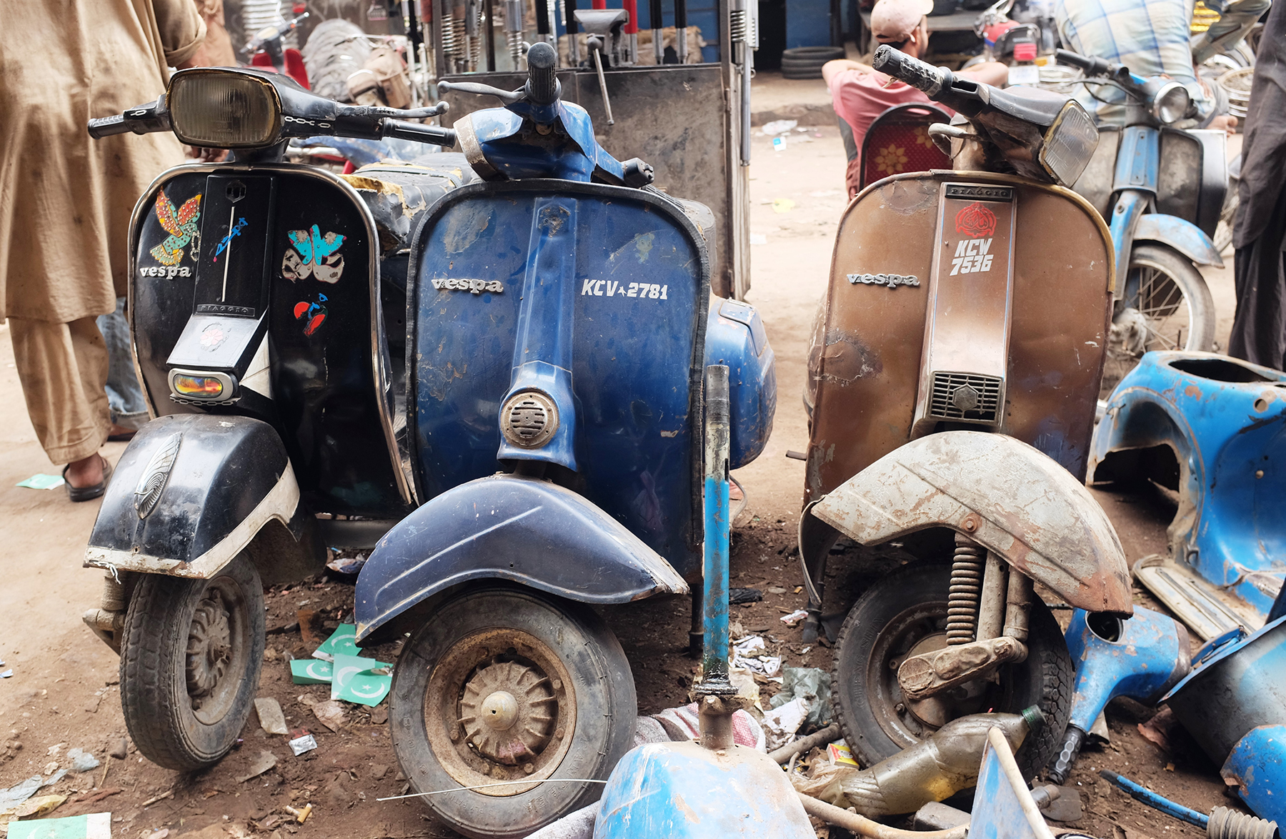 An assortment of colorful Vespas.