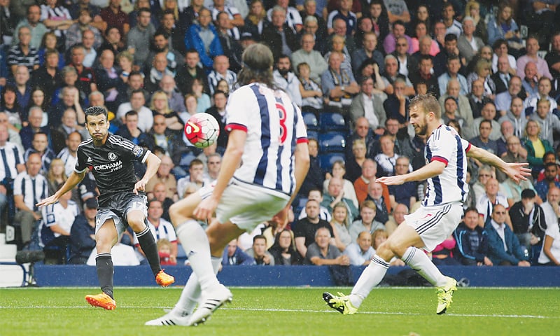 WEST BROMWICH: Chelsea&rsquo;s Pedro (L) puts in a cross during the English Premier League match against West Bromwich Albion at the Hawthorns on Sunday.&mdash;AFP