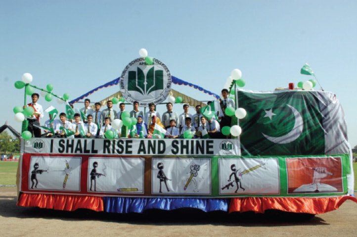 A float carrying Army Public School students takes part in a Defence Day event at Captain Karnal Sher Khan Shaheed Stadium, Peshawar, on Sunday. —White Star