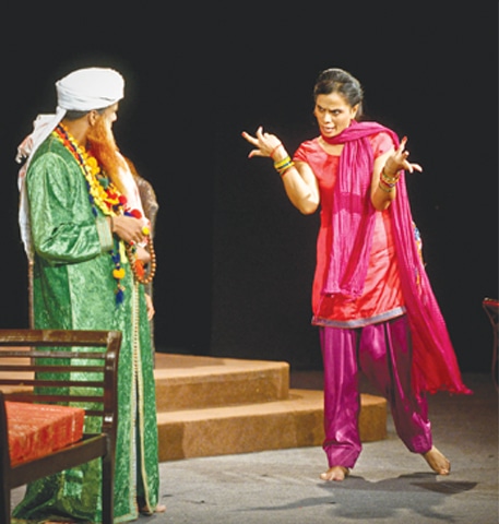 Marjeena (Muzeena Malik) in a heated discussion with Baba (Zakiullah) in a scene from the play Baba Jalinoos.&mdash;Fahim Siddiqi / White Star