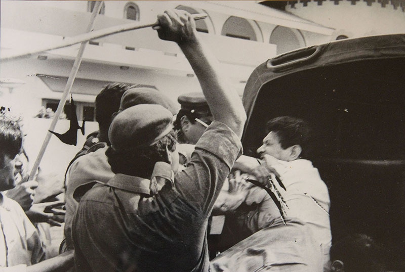 Firebrand leftist leader, Miraj Mohammad Khan, being hauled up by the police during the 1983 MRD Movement in Karachi.