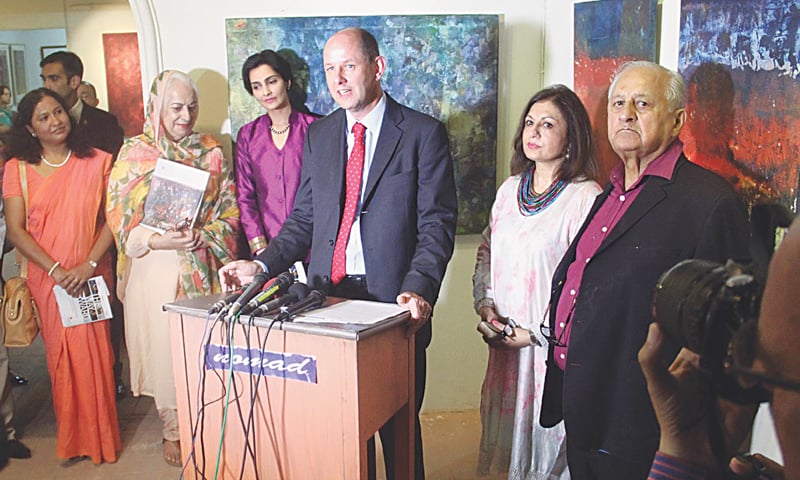 British High Commissioner for Pakistan Philip Barton speaks during the painting exhibition while PCB chairman Shaharyar Khan looks on. — INP